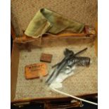 Vintage suitcase with a Webley Senior Pistol (A/F), a canvas holster, a tin of Webley 22 special