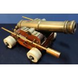 Quality scale model of a brass barrelled naval gun with 11 inch barrel