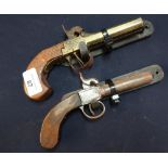 19th C brass double barrelled percussion cap pocket pistol and a single barrelled pocket pistol,