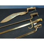 Group of four assorted bayonets including two 19th C steel socket triangular form bayonets, circa