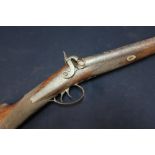 19th C percussion cap double barrelled sporting gun with engraved scrollwork to the action, with