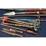 Large selection of various assorted reproduction weapons including hand axes, hand spears, 20th C