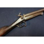 16 Bore double barrelled pin fire shotgun with elaborate trigger guard and brass stub mounts to