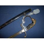 Imperial German Officers dress sword with 30 1/2 inch part single fullered slightly curved blade