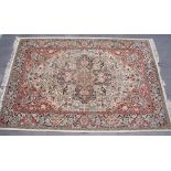 Traditional Keshan wool rug, terracotta and beige ground central stylised floral medallion with