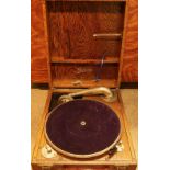 1930s Dulcetto travelling wind-up gramophone in brown leather case with nickle plated strengthened