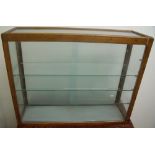 Early to mid 20th C rectangular counter top display cabinet with four internal shelves and frosted