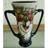 Moorcroft Royal House of Windsor twin handled Rhousel cup (15.5cm high) with monogram initials to