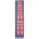 Islamic runner blue and red ground, central motif with stylized animals (167cm x 40cm)