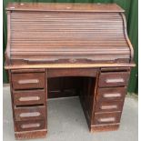 Edwardian oak twin pedestal roll top desk (width 106cm)