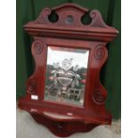 Late Victorian mahogany wall shelf with carved detail to the border and central etched glass bevel