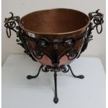 Unusual early 20th C copper jardinière in wrought metal frame (height 45cm)