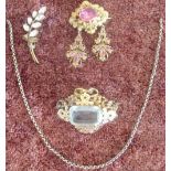 Selection of Victorian dress jewellery including an elaborate gilt metal embossed brooch with