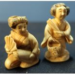 Edo period Japanese Netsuke in the form of a Geisha girl with signature to the base and another (2)