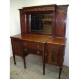 Edwardian mahogany break front mirrored back serving table with raised bevelled edge mirror back