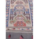 Middle Eastern traditional pattern textile wall hanging blue and fawn ground (175cm x 127cm)