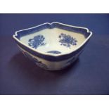 Large 19th/20th C blue and white bowl of square form depicting floral details and central circle