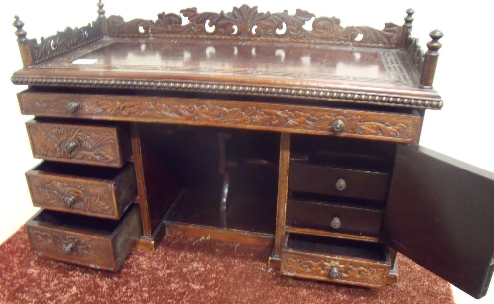 19th/20th C mahogany Oriental style table desk, the raised back and sides with carved fretwork - Image 2 of 2