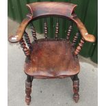 Victorian Smokers Bow style armchair with double H shaped understretcher and turned supports