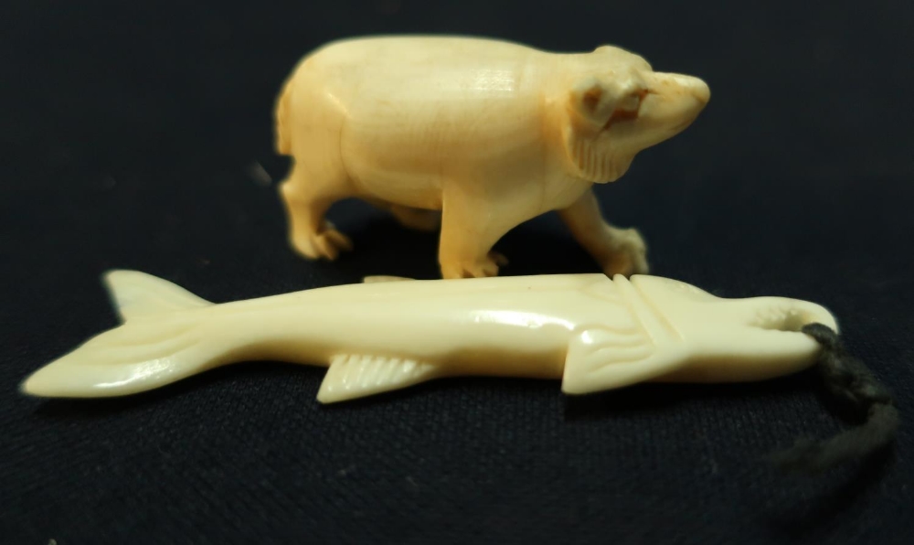 Early 20th C carved ivory figure of a bear, and another of a fish (2)