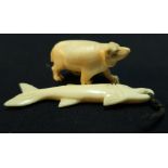 Early 20th C carved ivory figure of a bear, and another of a fish (2)