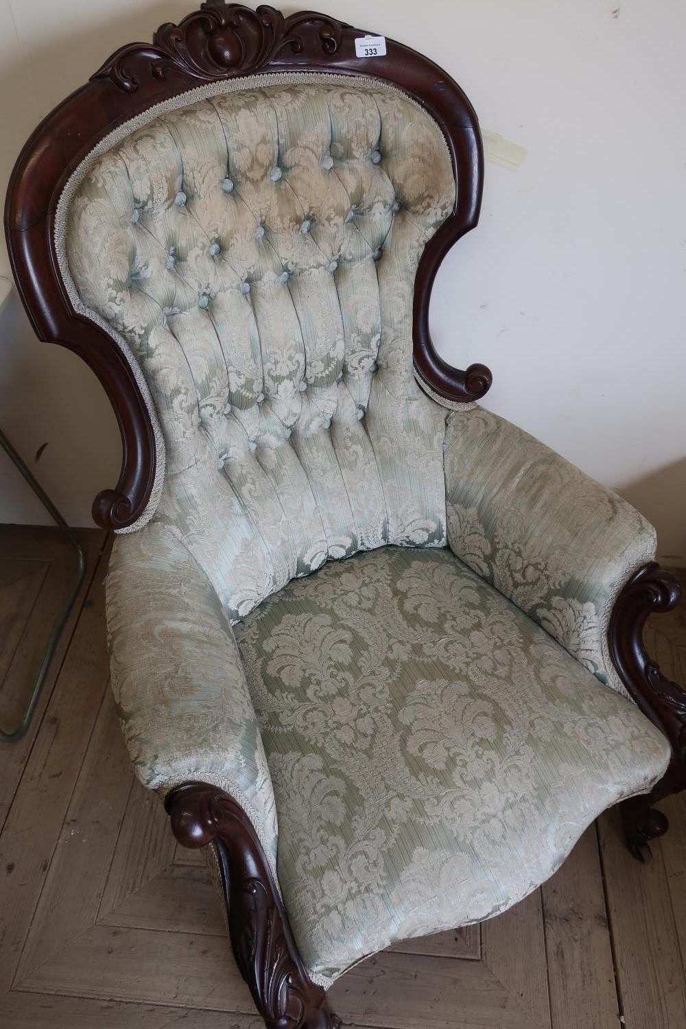 Victorian mahogany framed armchair with deep buttoned upholstered back