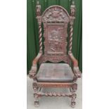 19th C elaborately carved oak throne type chair with arched top with central Coat of Arms flanked by
