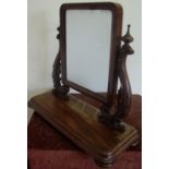 19th C rectangular dressing table mirror on stepped base with bun feet and carved wood supports (