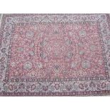 Contemporary traditional Persian pattern rug pink and beige ground stylised floral patterned