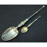 A large Birmingham silver hallmarked and enamel anointing spoon and a similar smaller spoon (2)