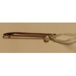 Gents gold tie pin set with single pearl stamped 9ct