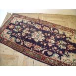 Blue & beige ground Persian pattern woollen rug (203cm x 103cm)