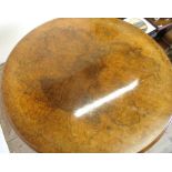 Victorian walnut circular tilt top breakfast table on carved supports (diameter 125cm)