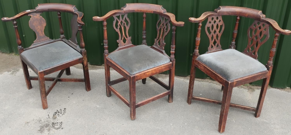 Three similar early 19th C mahogany framed corner armchairs with drop-in seats