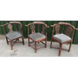 Three similar early 19th C mahogany framed corner armchairs with drop-in seats