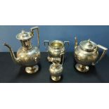 A Sheffield 1879 large and elaborate silver hallmarked tea service comprising of twin handle sugar