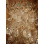 Large quantity of various quality cut glass drinking glasses including Edinburgh Crystal