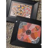 A pair of framed Australian Aboriginal artworks