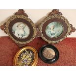 Two early 20th C framed classic style prints of ladies, a framed ceramic still life plaque the