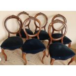 Set of six Victorian walnut framed dining chairs with upholstered seats