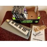 Boxed Hohner mouth piece, a Hohner Melodica Piano 26, various booklets, professional studio