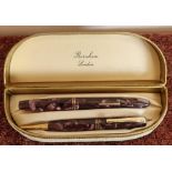 Cased Burnham ink pen and pencil set with 14ct gold nib