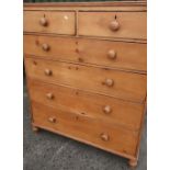 Large Victorian pine chest of two short above four long drawers on turned supports (111cm x 51cm x