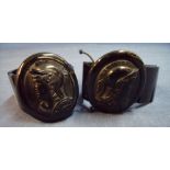 Pair of similar Whitby jet bracelets with large cameo profile panel depicting a Greek style warriors