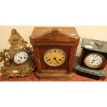 Victorian black slate mantel clock, a French style gilt cased mountain clock, and an oak mantel