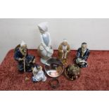 Selection of Chinese terracotta figures, a giant clear glass witches type ball, paperweight, Nao