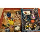 Two boxes containing a selection of various glassware including paperweights, Mdina glass, stained