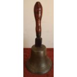 Extremely large brass hand bell, the top marked H30 with turned wood handle