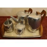 Picquot ware five piece tea set comprising of twin handled tray, teapot, hot water jug, milk jug and