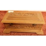 Eastern carved wood rectangular table box with hinged top revealing lined interior with label marked